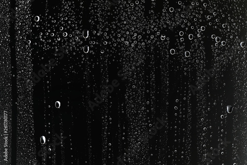 black wet background   raindrops for overlaying on window  concept of autumn weather  background of drops of water rain on glass transparent