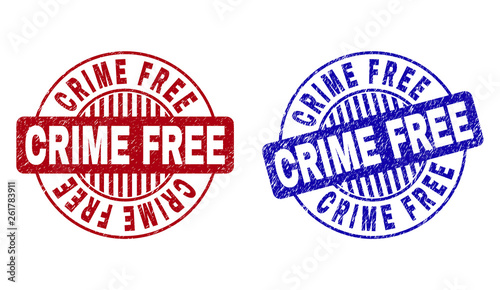 Grunge CRIME FREE round stamp seals isolated on a white background. Round seals with grunge texture in red and blue colors. Vector rubber watermark of CRIME FREE text inside circle form with stripes.