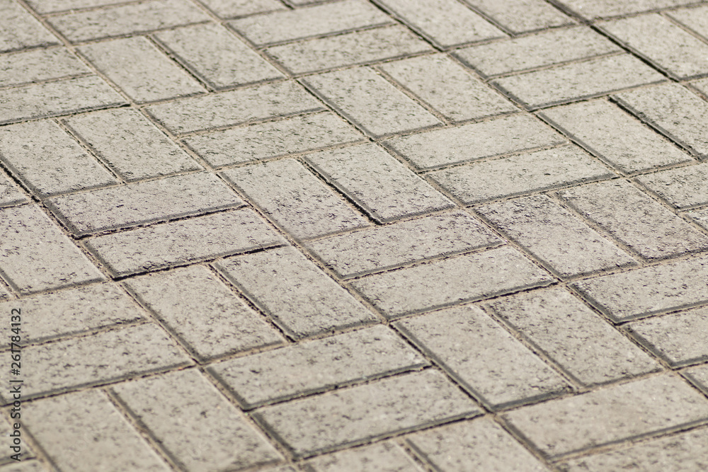 Abstract background - gray paving slabs in the form of squares.