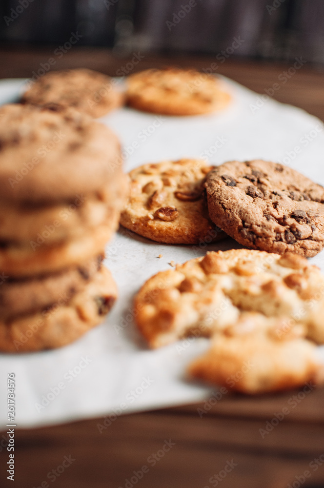 Chocolate cookies on wooden table. Chocolate chip cookies shot Chocolate cookies on wooden table. Chocolate chip cookies shot