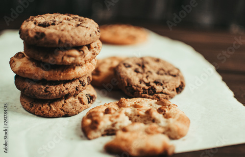 Chocolate cookies on dark wood background