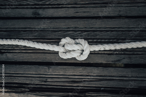 Sprite knot on wooden background