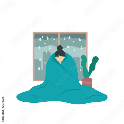 Sad sick woman in depression covered with blanket