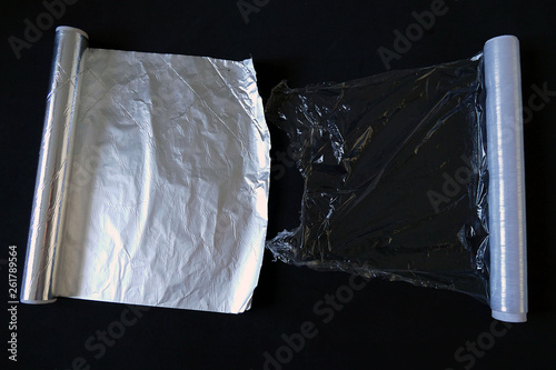 Aluminum foil, refrigerator bag and stretch film on black background,