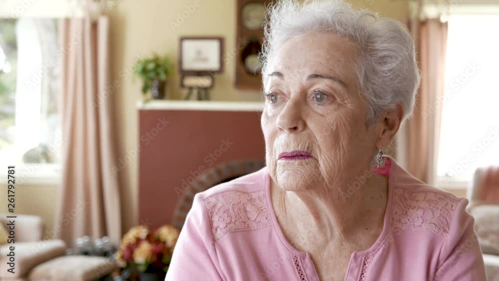 Senior citizen has a lot on her mind as she thinks about the past. Senior citizen has a lot on her mind as she thinks about the past.