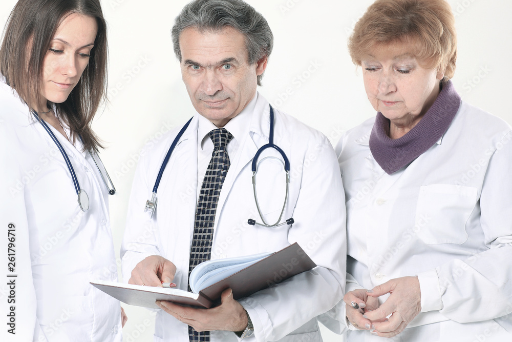 group of doctors discuss the diagnosis of the patient.isolated on white background group of doctors discuss the diagnosis of the patient.isolated on white background