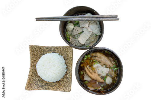 Top view of Pork and Chicken foot soup on white isolated, focus selective