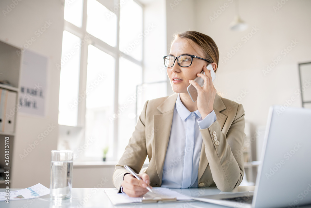 Inspired business lady talking on phone Inspired business lady talking on phone