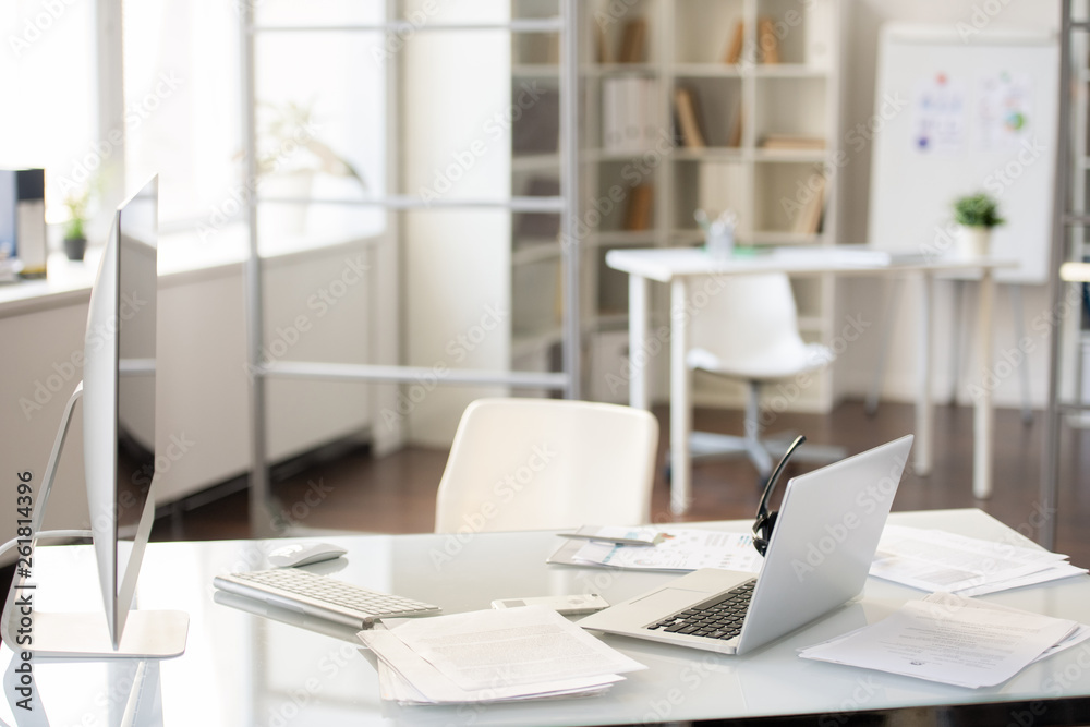 Office desk with two computers