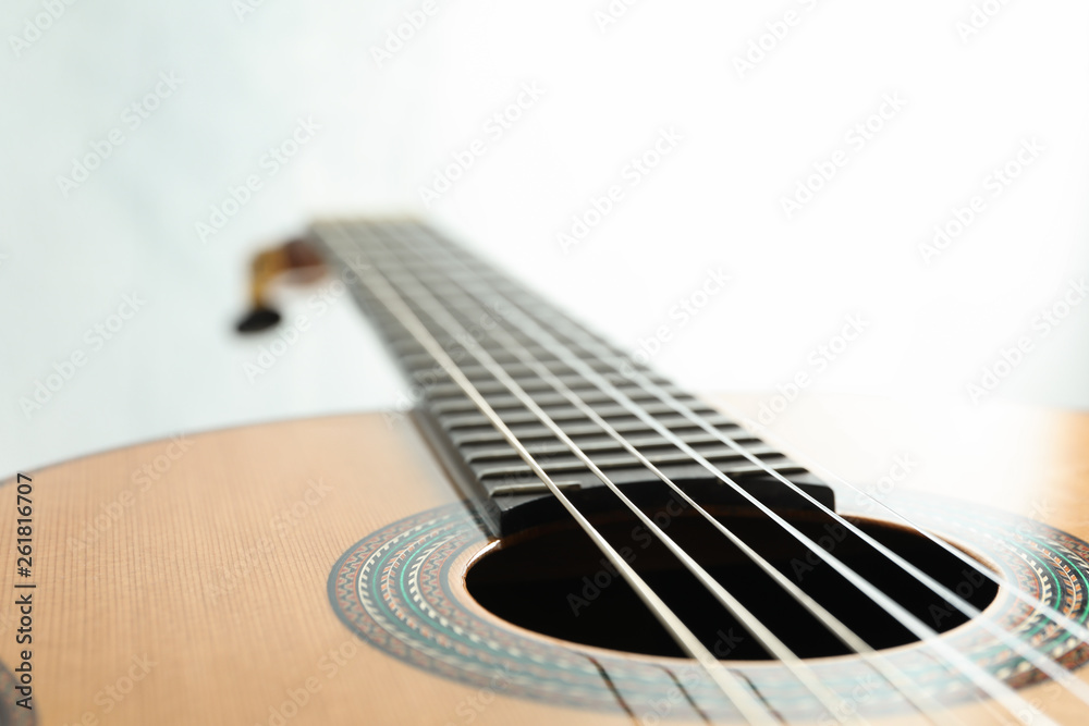 Fototapeta premium Beautiful six - string classic guitar on white background, closeup