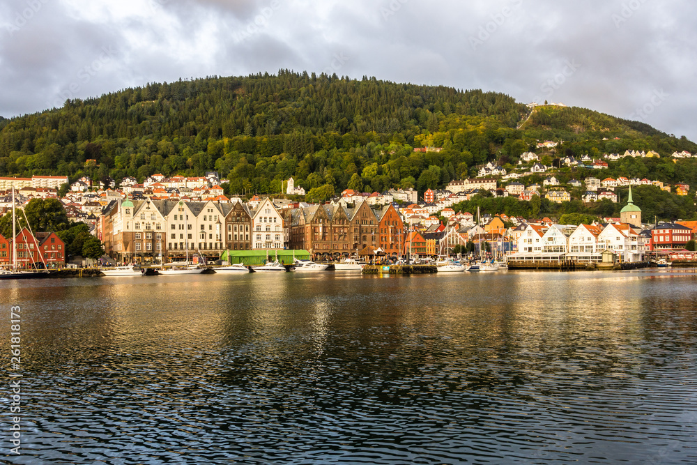 Bergen harbour with iconic historical buildings and Mount Floyen in the background, Norway