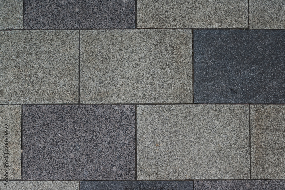 Naklejka premium Gray granite. Rectangular pavement slab. Top view.
