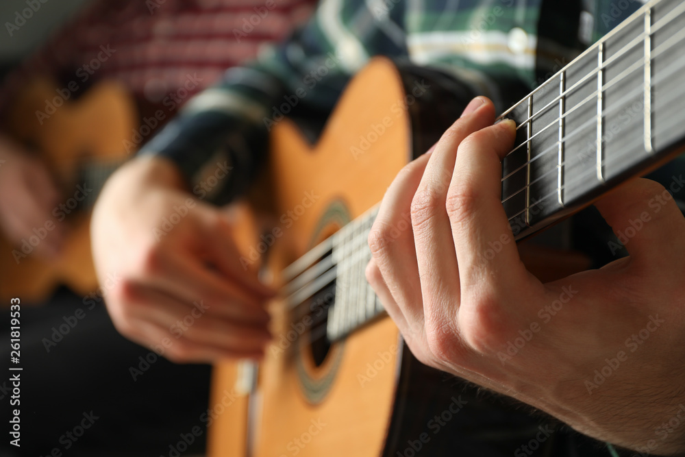 Two guitar players with classic guitars, space for text Two guitar players with classic guitars, space for text