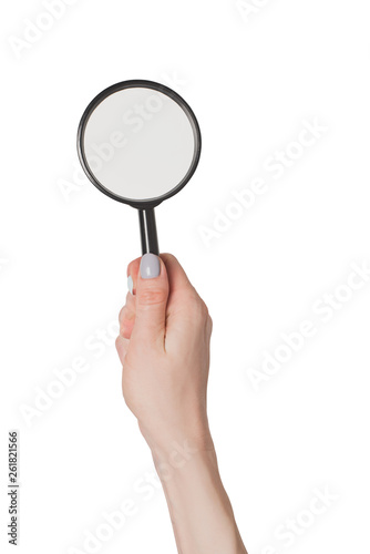 Female hand holding magnifier isolate on white background