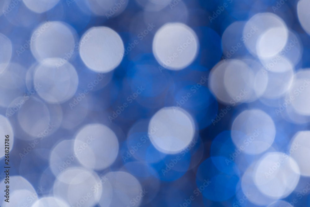 Fototapeta premium Abstract background. White and blue circles in bokeh
