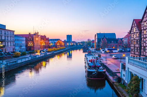 Bydgoszcz old town at amazing sunrise with reflection in Brda river. Bydgoszcz. Poland © cone88