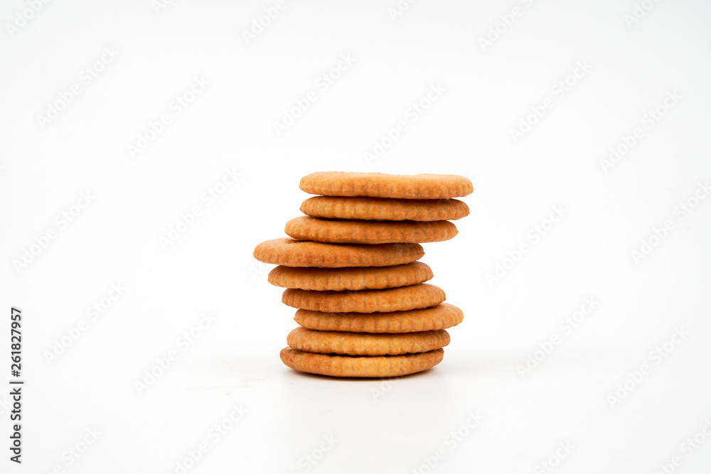 Stack of salted biscuits isolated on white background. Stack of salted biscuits isolated on white background.