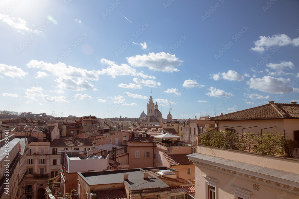 View of Rome from a terrace, overseeing the rooftops of buildings in the center of the city
