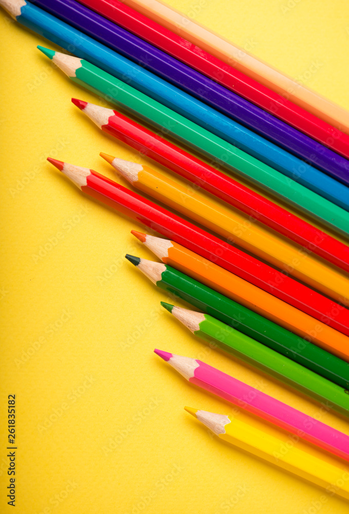 Fototapeta premium Education. The pencil on the yellow background