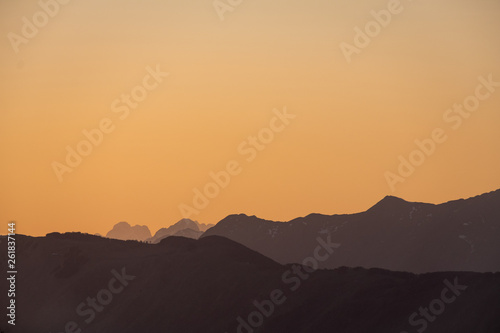 Sunset over mountains Mangart  Kanin in Julian Alps in spring