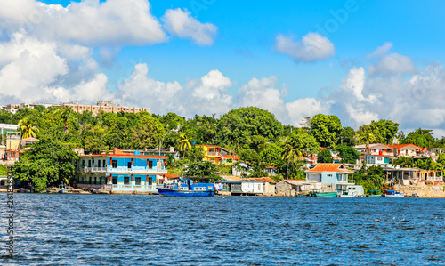 Jagua Cuban village with colorful houses on the hill and fishing boats   Cienfuegos province  Cuba