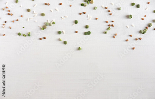 Pattern with buckwheat, wheat, peas and rice on a white background. Pattern with healthy cereals for food