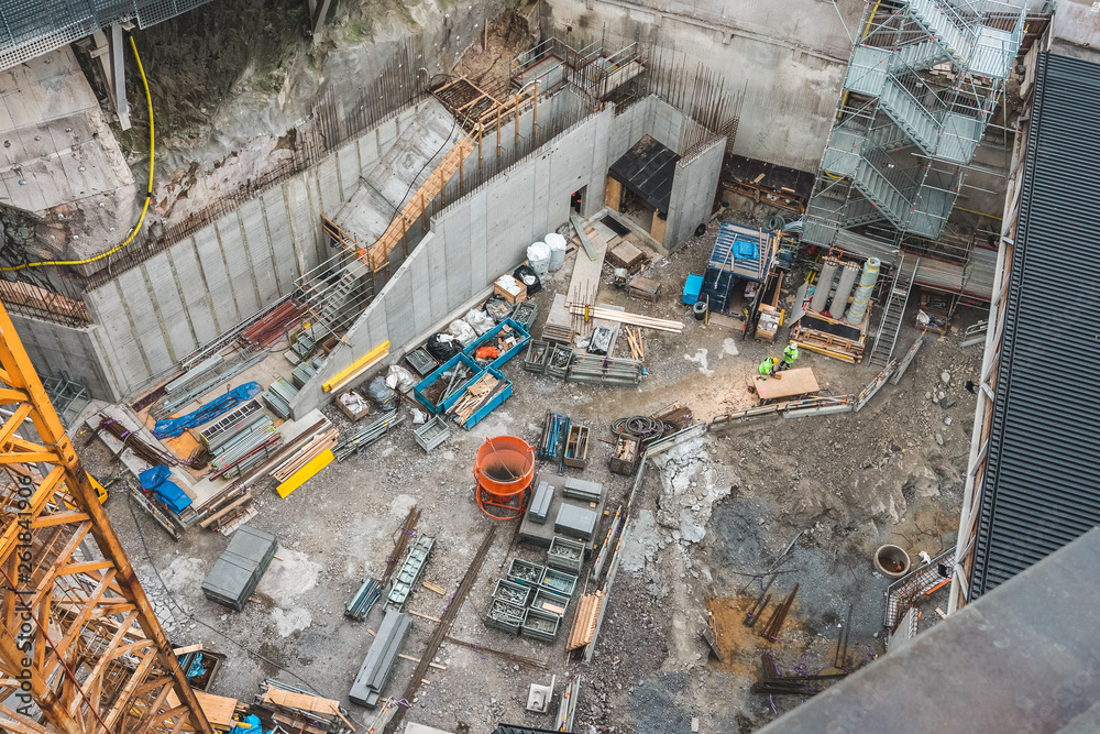 Storage area of a construction site with lots of different equipment and material, Sweden