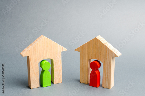 Two neighbors. Good neighborhood, district. Communication, communication between two people and houses. Houses in the village. Two wooden houses with neighbors. photo