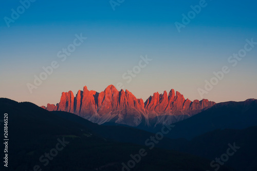 red mountain at sunset. Dolomites landscape in Val di Funes, Italy © Ioan Panaite