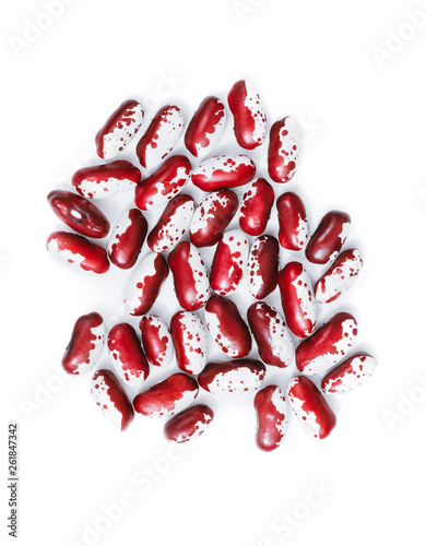 Pile of ripe speckled kidney Anasazi beans, with vivid burgundy color isolated on white background. Close-up.