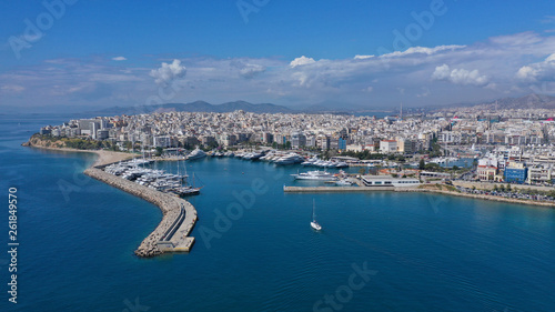 Aerial drone panoramic photo of iconic port of Marina Zeas or Pasalimani with yachts and sail boats docked and beautiful blue sky - clouds, port of Piraeus, Attica, Greece © aerial-drone
