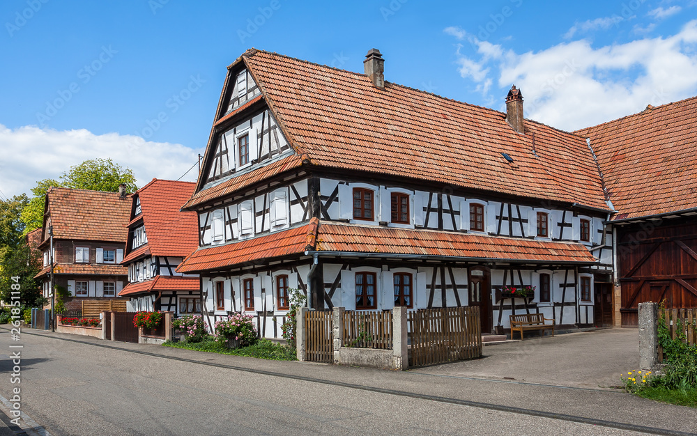 Traditional half-timbered houses in the streets of the small town of Hunspach in Alsace Traditional half-timbered houses in the streets of the small town of Hunspach in Alsace