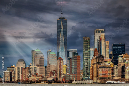 Skyline of Manhattan NYC at a cloudy day seen from a ferry