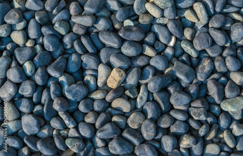 Azure or bluish stone pebbles as background