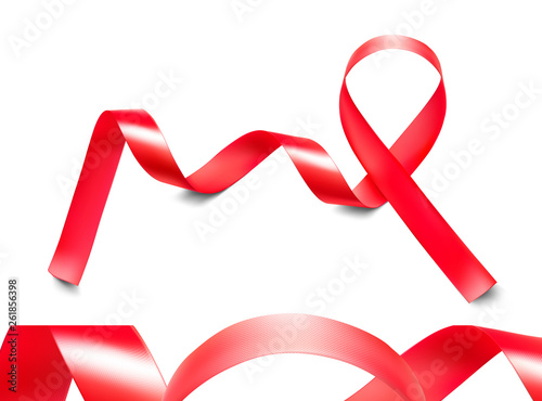 High realistic red ribbon with atlas texture. Word aids day. Vector illustration isolated on white background. Ready for your design. EPS10.	