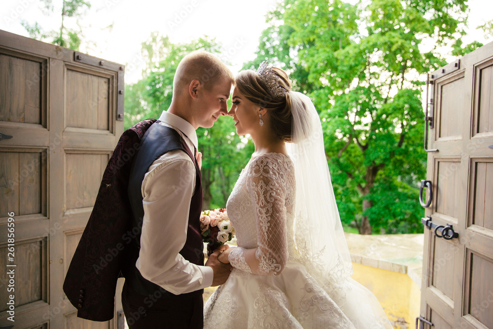 Wedding. Bride and groom walk outdoors Wedding. Bride and groom walk outdoors