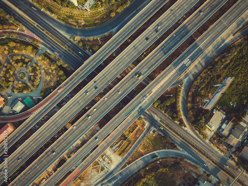 Aerial view of highway and overpass in city © escapejaja