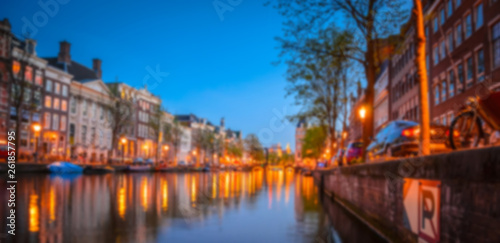 Blurred night panorama of Amsterdam, Netherlands.