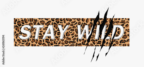 Stay Wild Fashion Slogan on leopard pattern background with claw scratch. Print for t shirt design with animal pattern and slogan. Vector illustration 