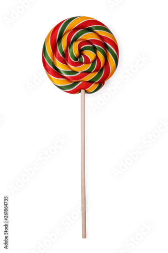 Close-up of colorful, hand-made swirl spiral lollipop isolated on white background. Studio shot