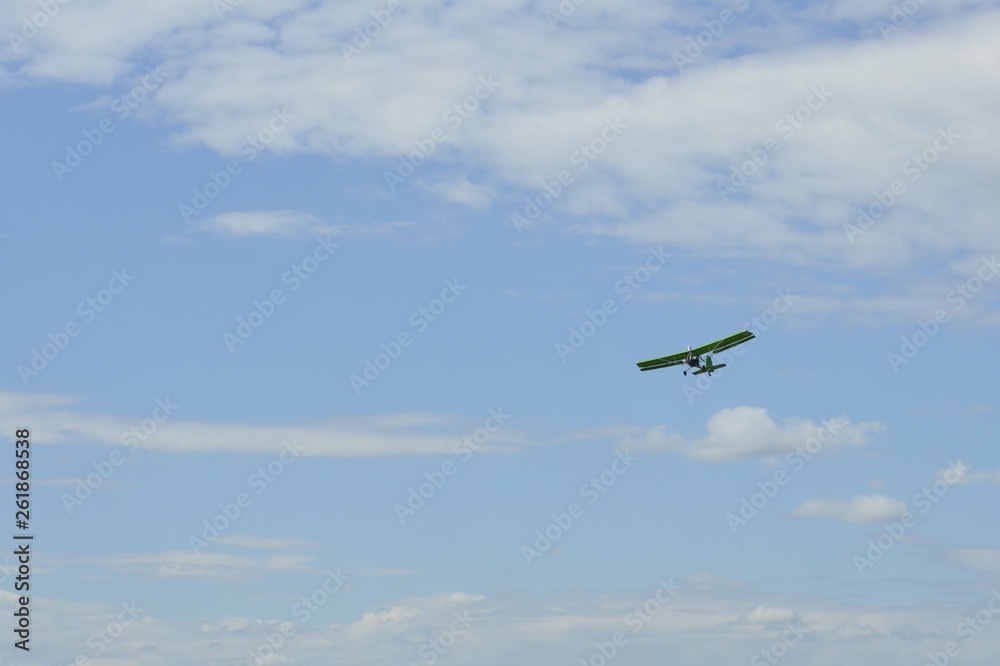 Sports plane in the sky performs aerobatics Sports plane in the sky performs aerobatics