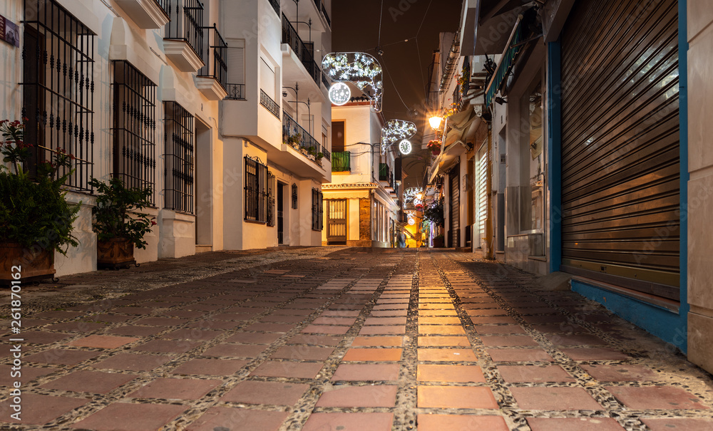 Obraz premium Empty night street of Marbella town, Andalusia, Spain