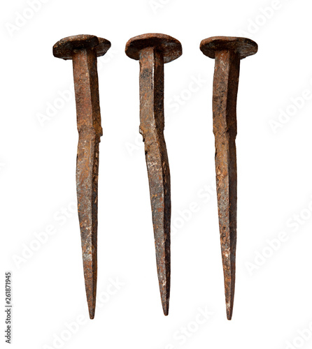 three old nails on white background