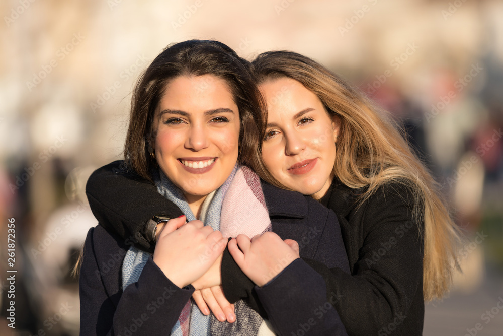 Young pretty girls best friends smiling and having fun Young pretty girls best friends smiling and having fun