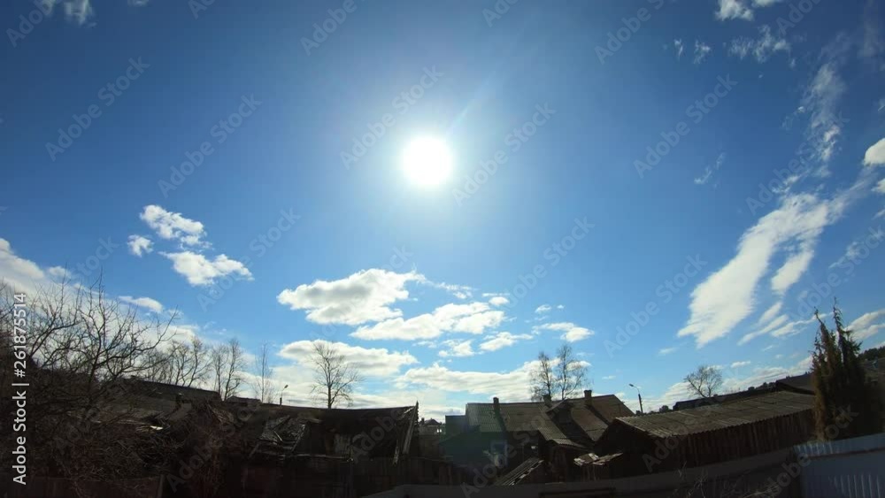 Movement of clouds over old abandoned wooden houses Movement of clouds over old abandoned wooden houses