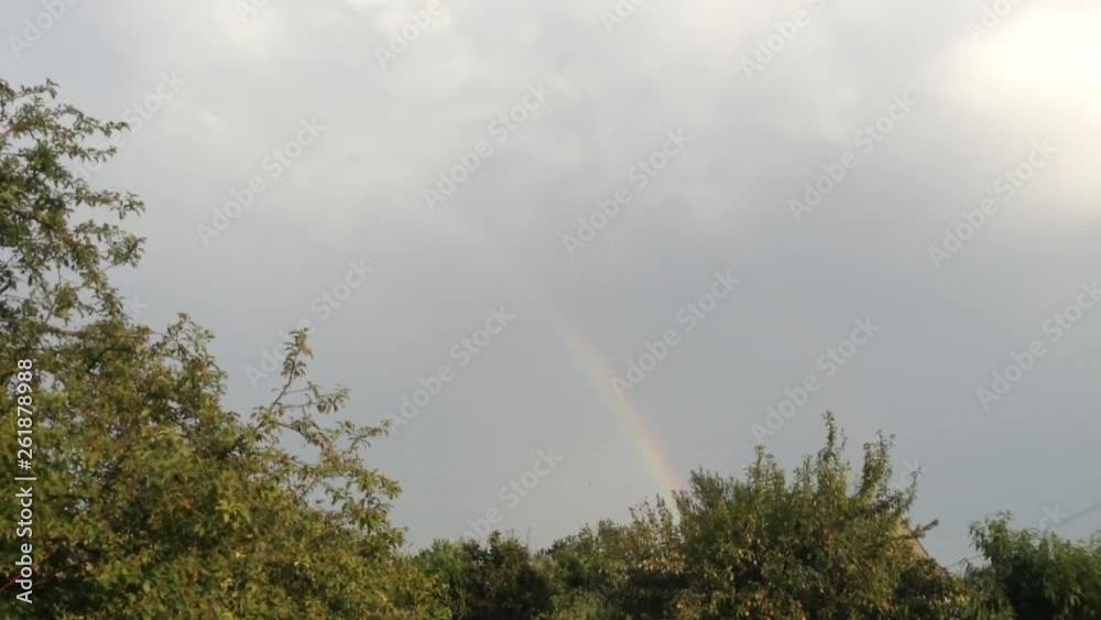 Double Rainbow In the Grey Sky and Green Trees In The Village Double Rainbow In the Grey Sky and Green Trees In The Village