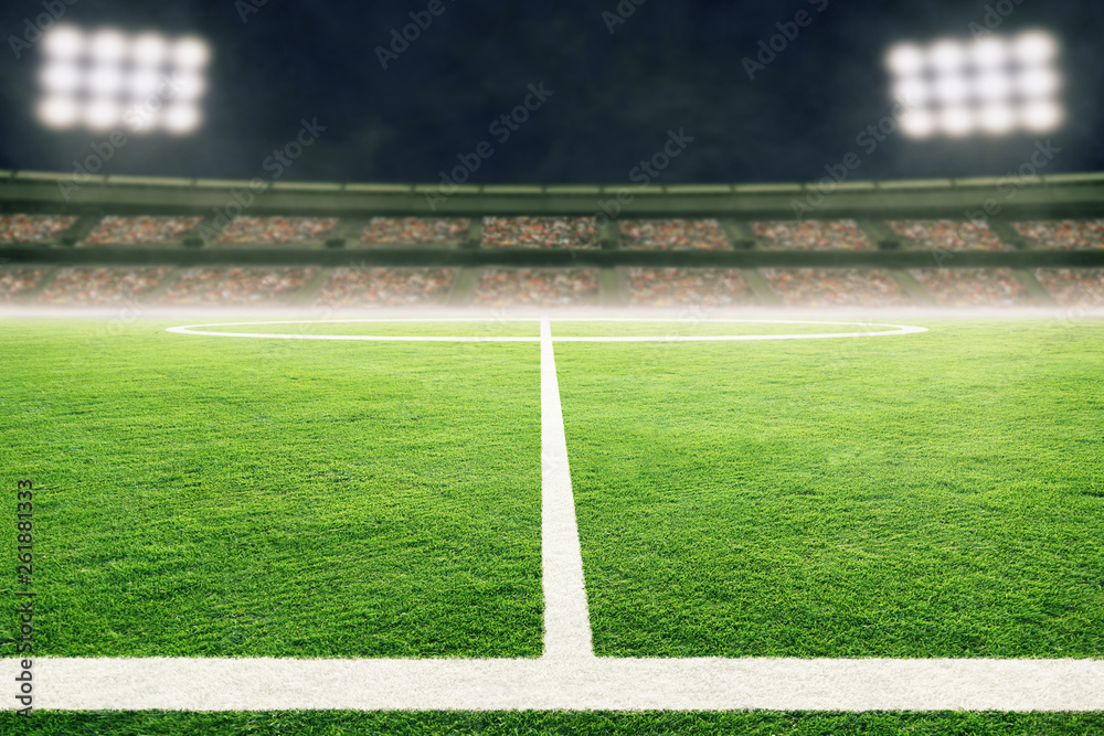 Low Angle View of Soccer Field With Stadium Lights and Copy Space