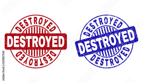 Grunge DESTROYED round stamp seals isolated on a white background. Round seals with grunge texture in red and blue colors. Vector rubber watermark of DESTROYED text inside circle form with stripes.
