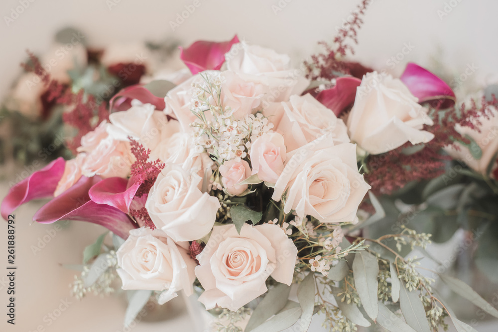Pink roses and Calla Lily bridal bouquet close up