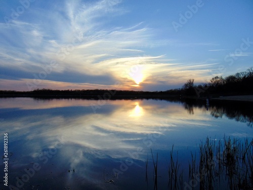 reflection of sunset on lake
